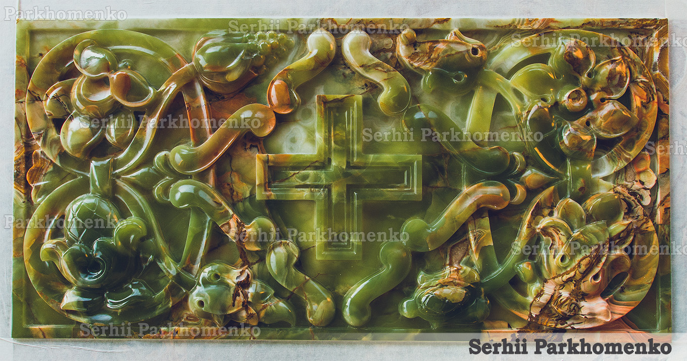 Bespoke high-relief Neo-Byzantine style carved green onyx panel featuring a central blossomed cross and ornate vine scrolls by Serhii Parkhomenko's studio