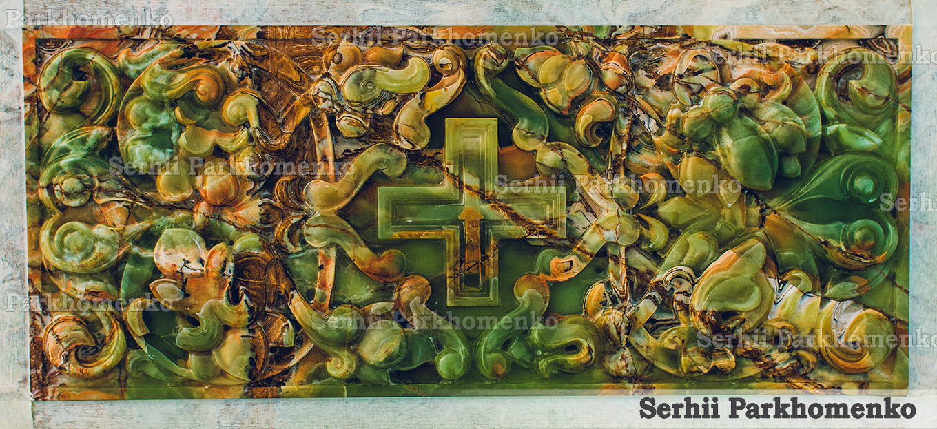 Frontal view of a spectacular Neo-Byzantine onyx relief panel with rich natural veining in emerald, amber, and iron-red tones