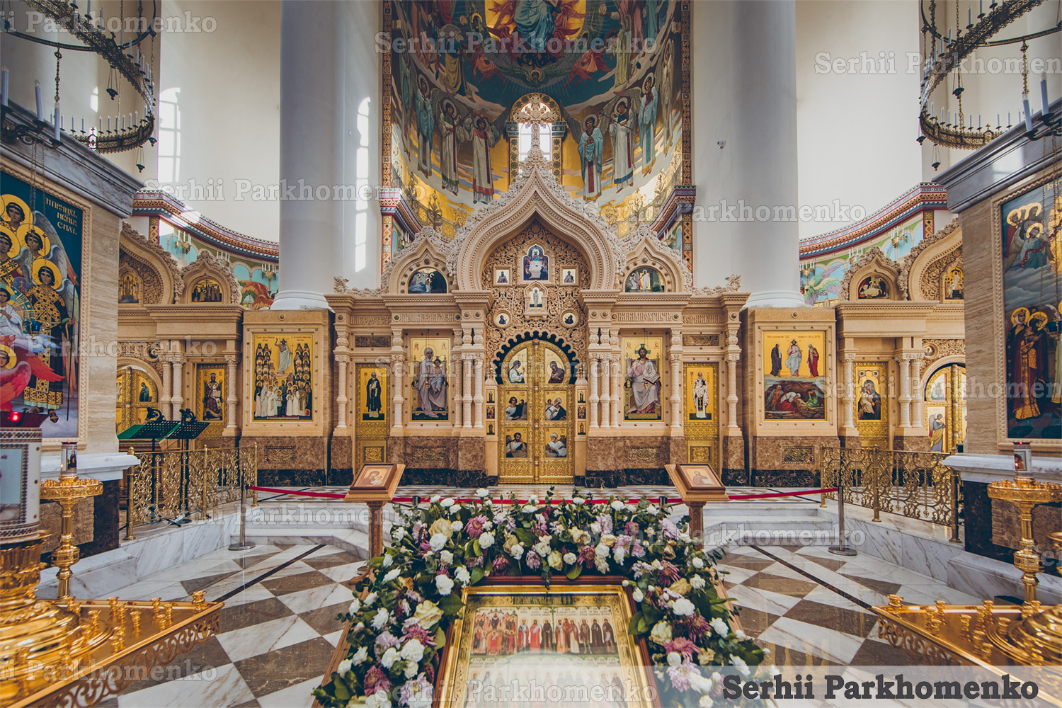 The completed majestic stone iconostasis inside the Cathedral of the Transfiguration of the Savior by Serhii Parkhomenko's studio