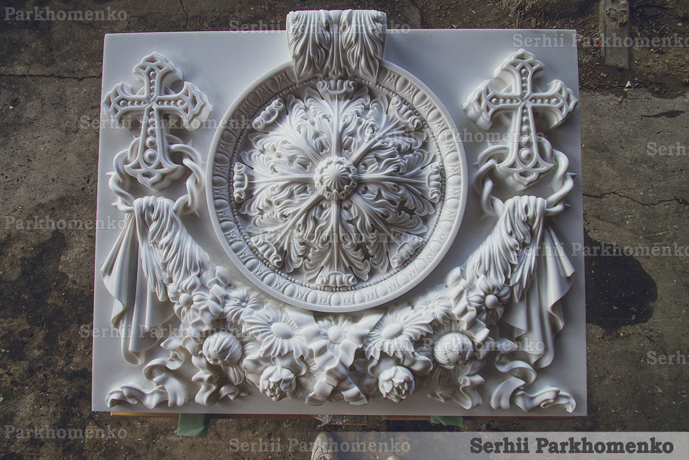 Front view of a monumental high-relief Thassos marble iconostasis base panel featuring a grand central rosette, garlands, and twin crosses by Serhii Parkhomenko's studio