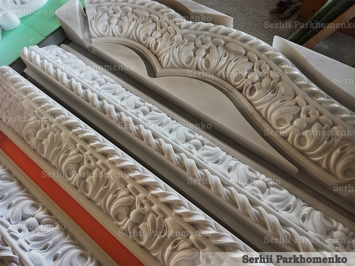 Carved stone portal frame elements for main gates in the workshop, awaiting final manual hand-finishing